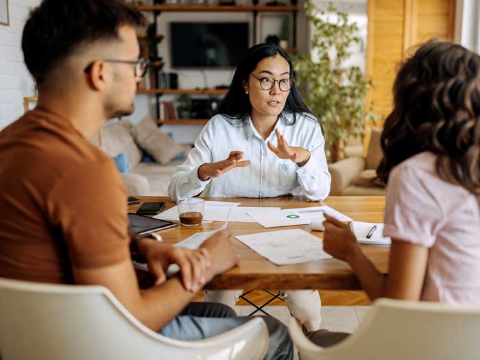 Young couple receiving financial advice